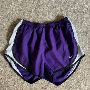 Purple Nike running shorts
